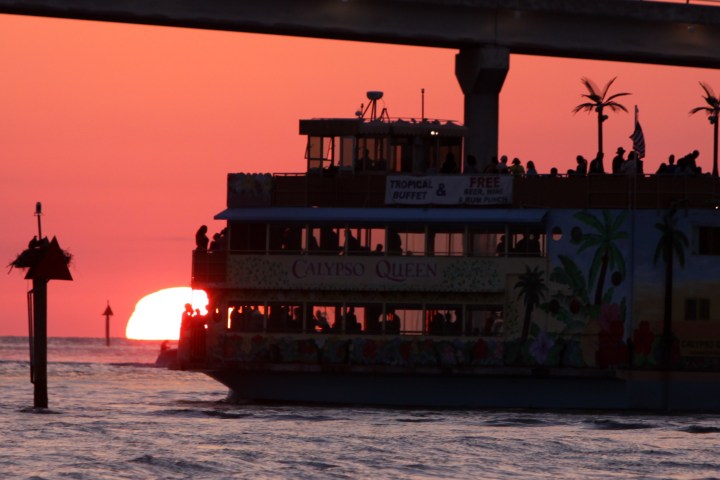 a large bridge lit up at night