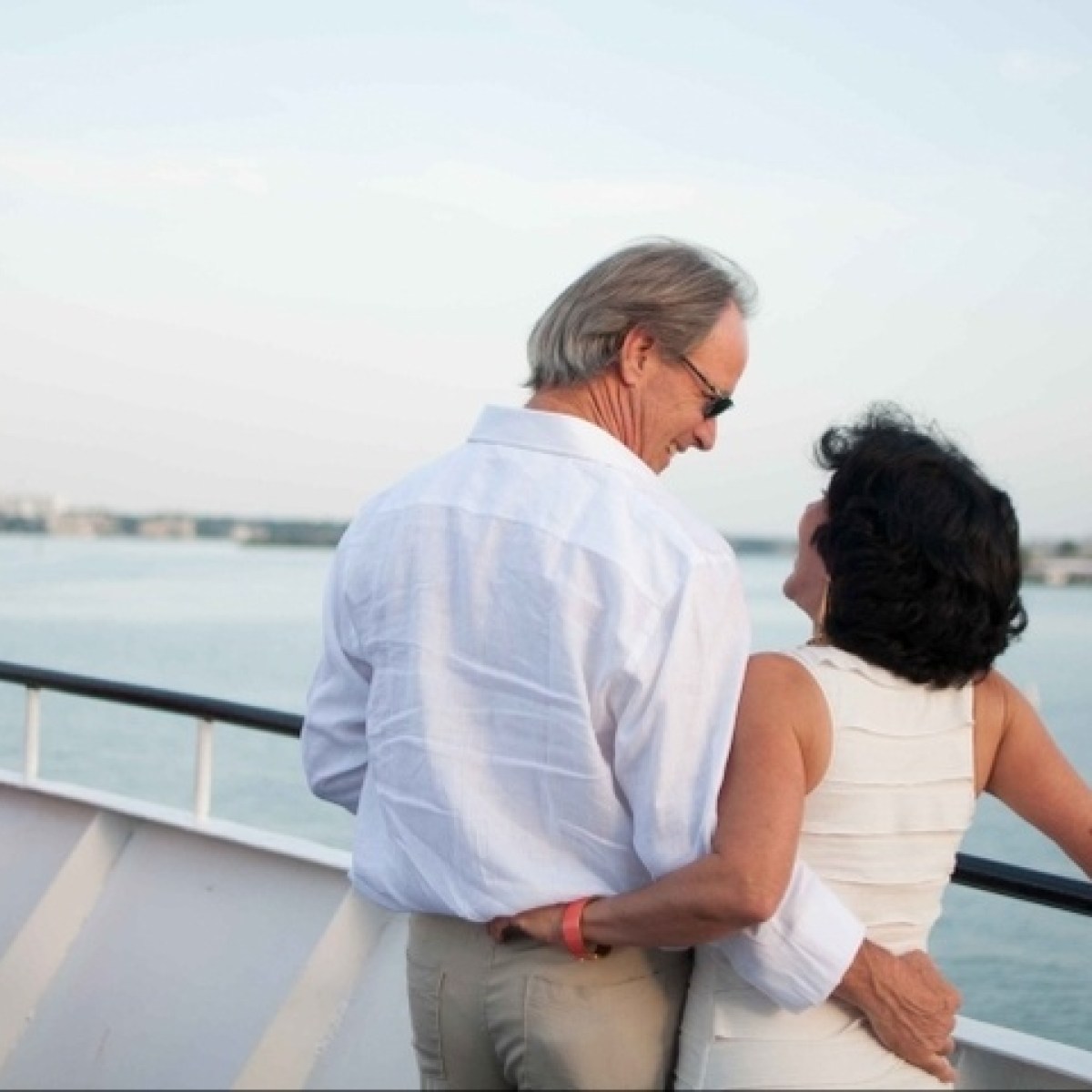 a person standing next to a dock