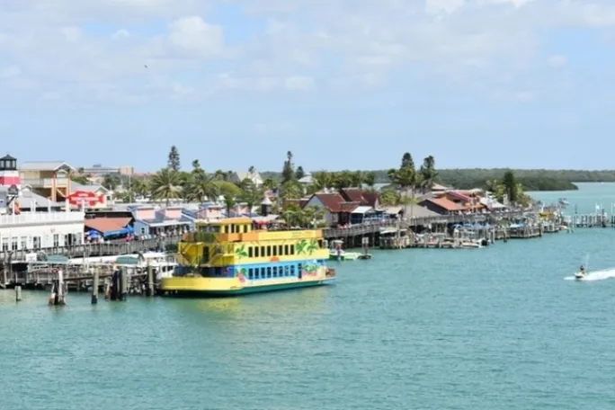 a small boat in a large body of water