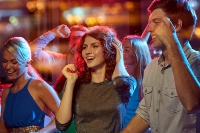 a group of people that are talking to each other