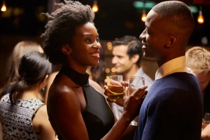 a group of people sitting at a table