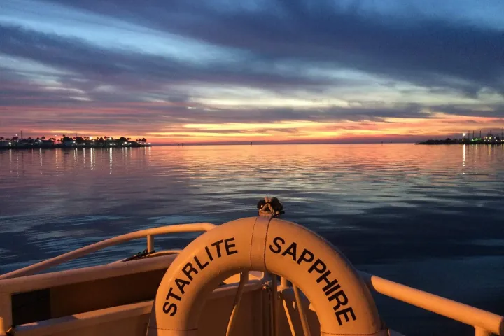a sunset over a body of water