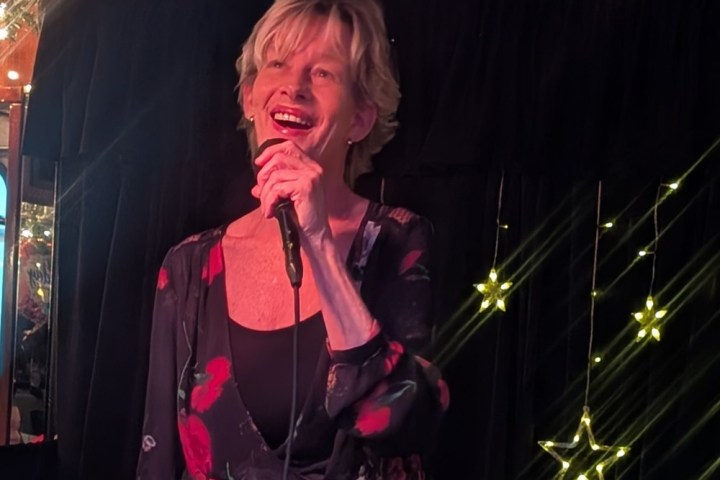 a person standing in front of a stage