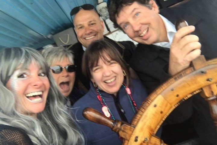 a group of people posing for the camera