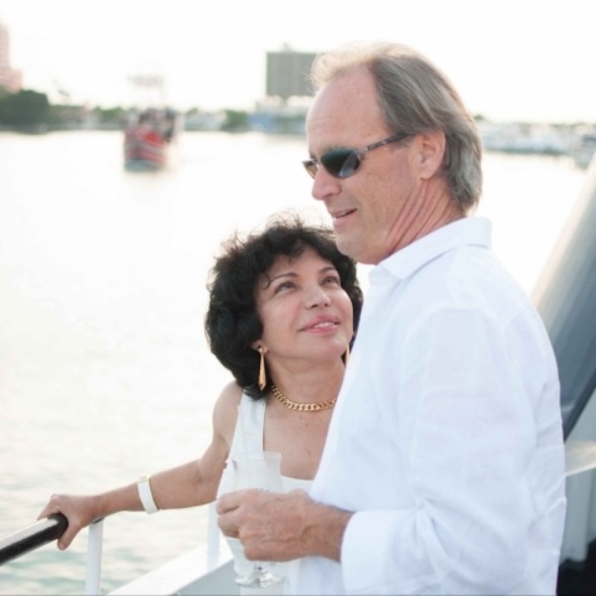 a person standing on a boat in the water