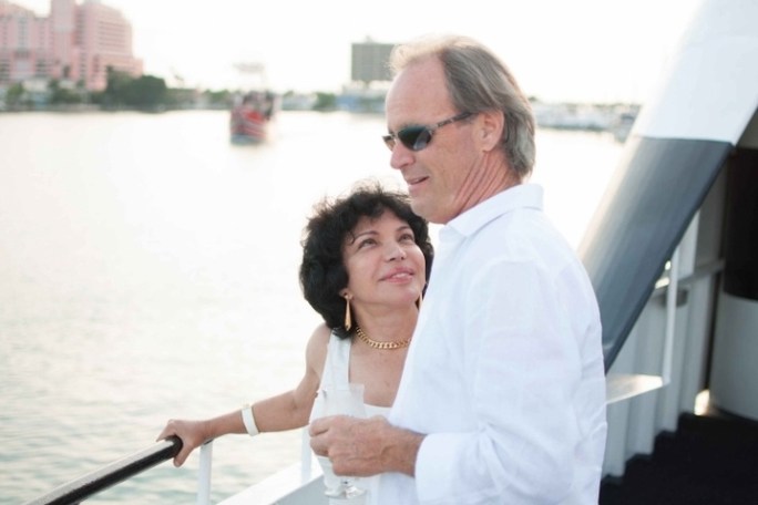a person standing on a boat in the water