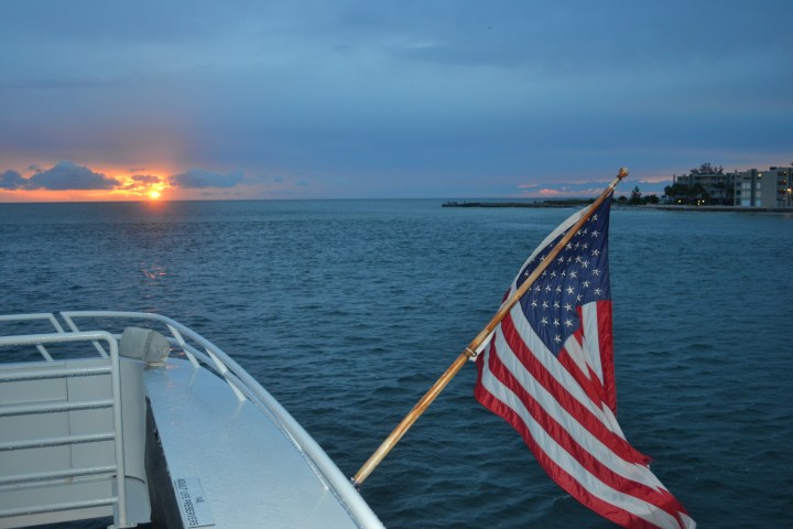 a small boat in a large body of water