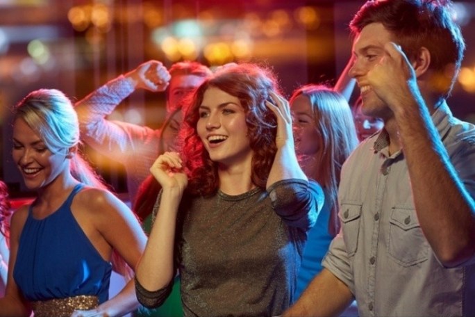 a group of people that are talking to each other