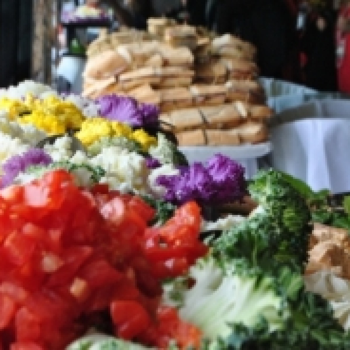 a close up of a plate of food with rice and vegetables