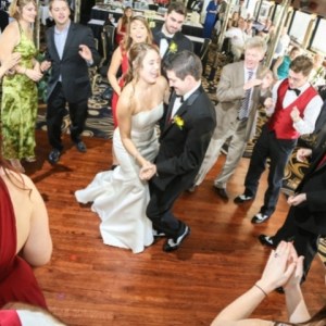 a group of people standing in front of a crowd